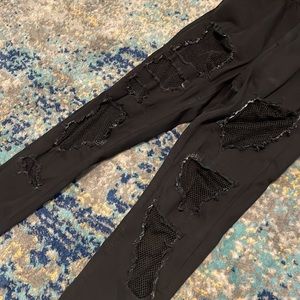 Topshop moto Jamie black jeans with fishnet mesh in holes